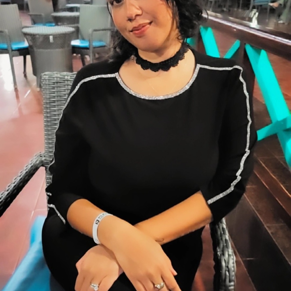 Chic Black Top with Silver Accents